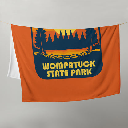 Wompatuck: Throw Blanket / Retro Sunset Badge / Orange